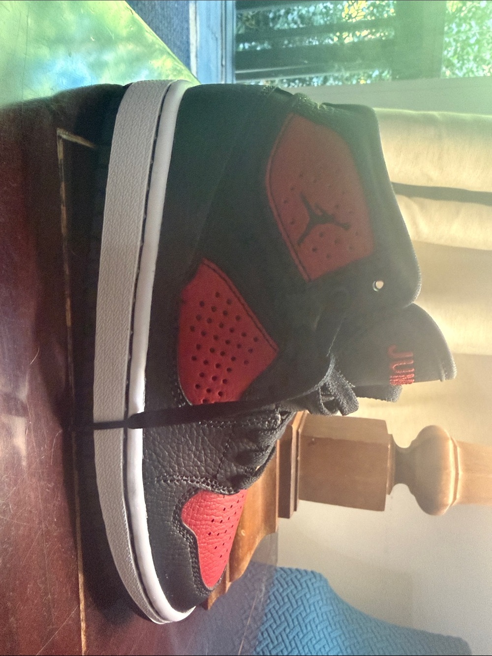 Jordan Kids Black and Red High-Top Sneakers